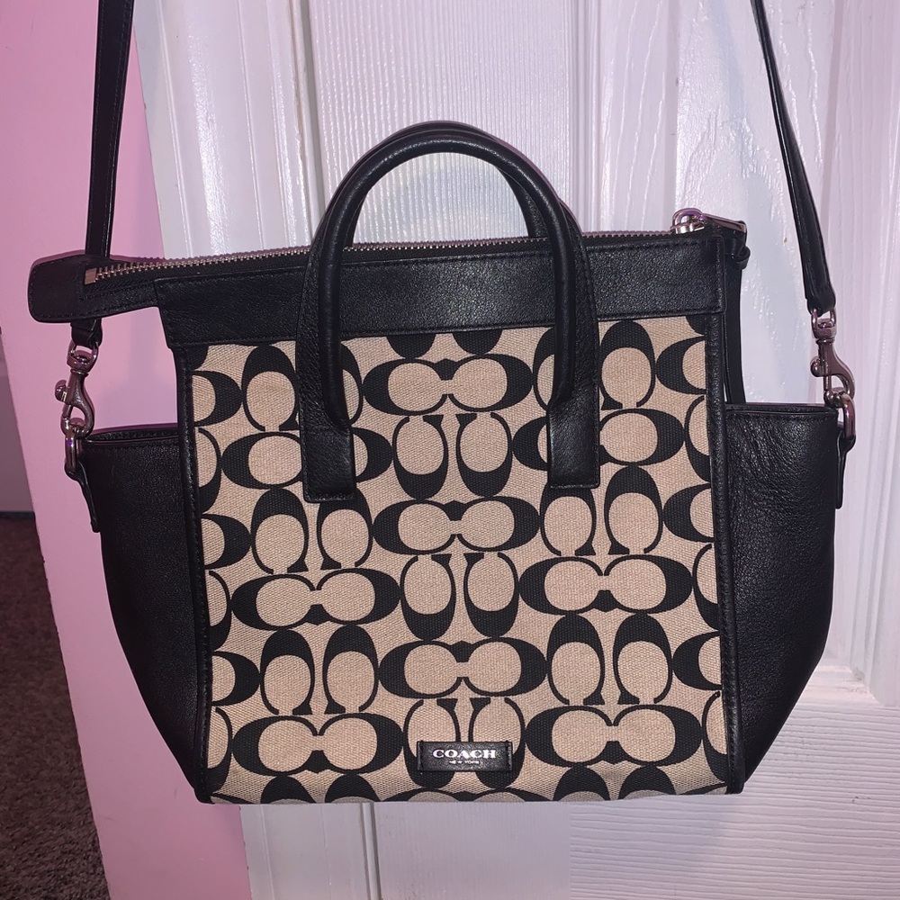 Coach black and cream colored crossbody